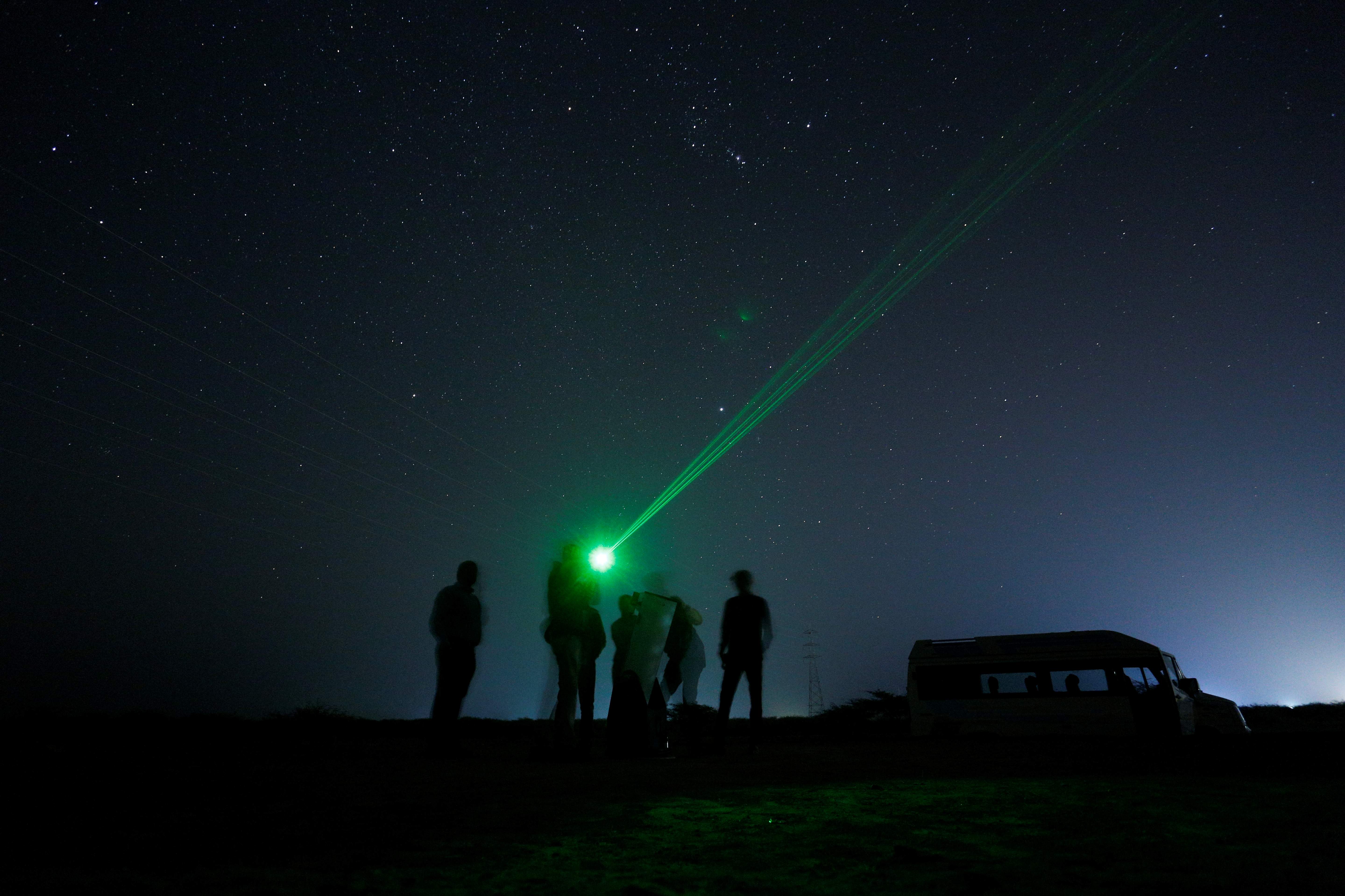Public stargazing session with telescopes.